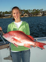 Erin Curtis with Red Snapper caught aboard the "Miss Celeste"